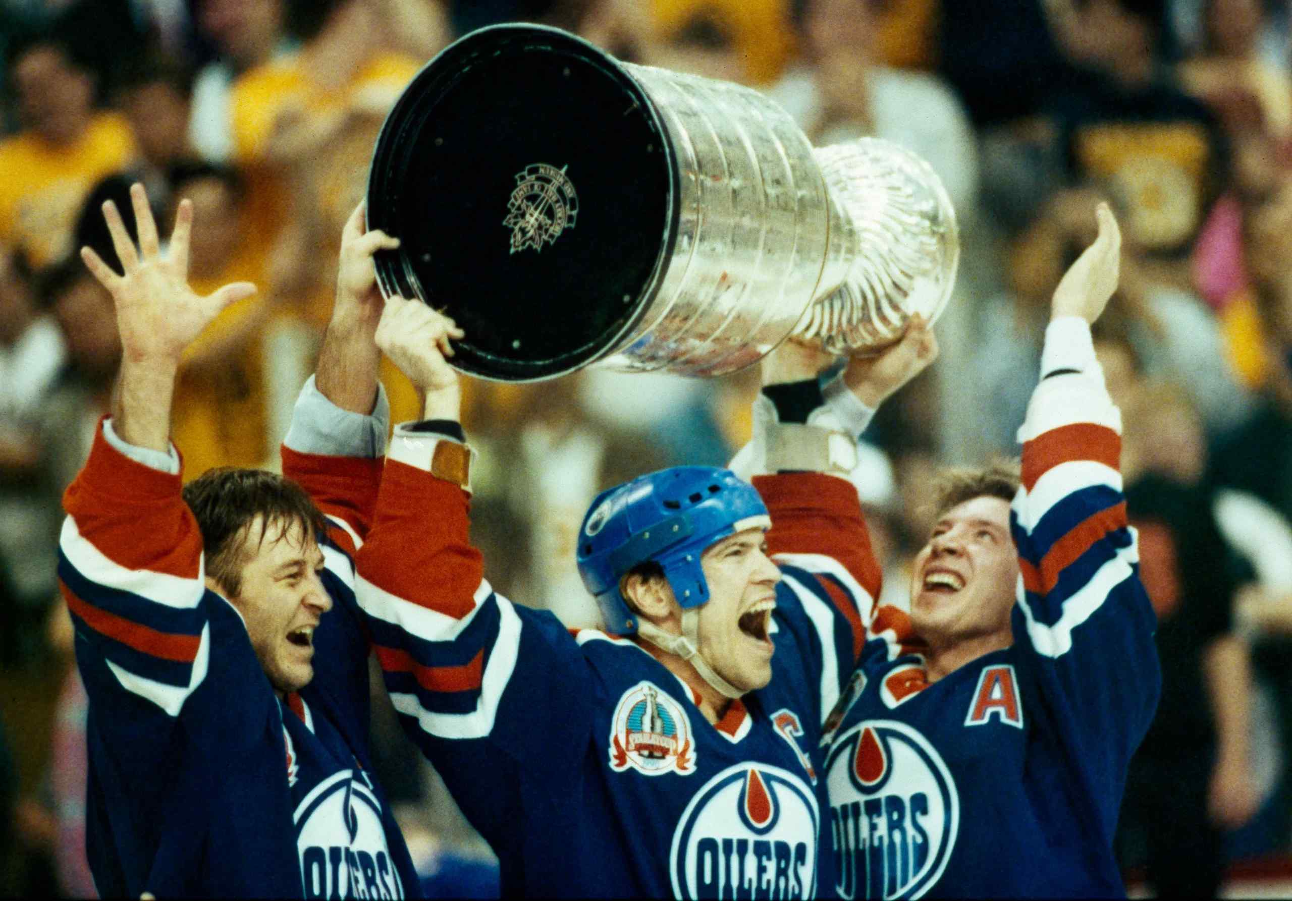 Edmonton Oilers, specifically Mark Messier, celebrating the Stanley Cup.